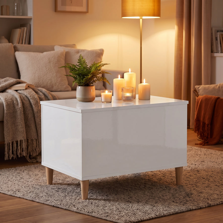 Table basse relevable Sylva blanc brillant, ambiance du soir aux bougies
