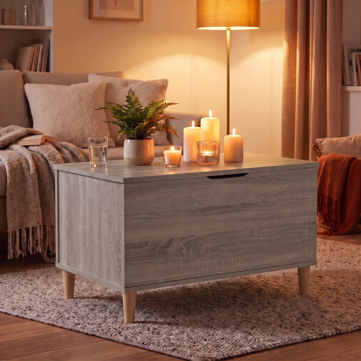 Table basse relevable Sylva sonoma gris, ambiance du soir aux bougies #Dimensions_90 × 44,5 × 45 cm #Couleur_Sonoma gris