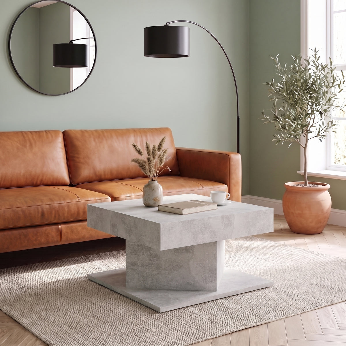 Table Dado gris béton en bout de canapé dans un salon lumineux #Couleur_Gris béton