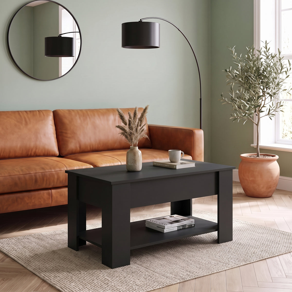 Table relevable Onda, noir, en situation dans un salon #Couleur_Noir #Dimensions_101 × 49 × 52 cm
