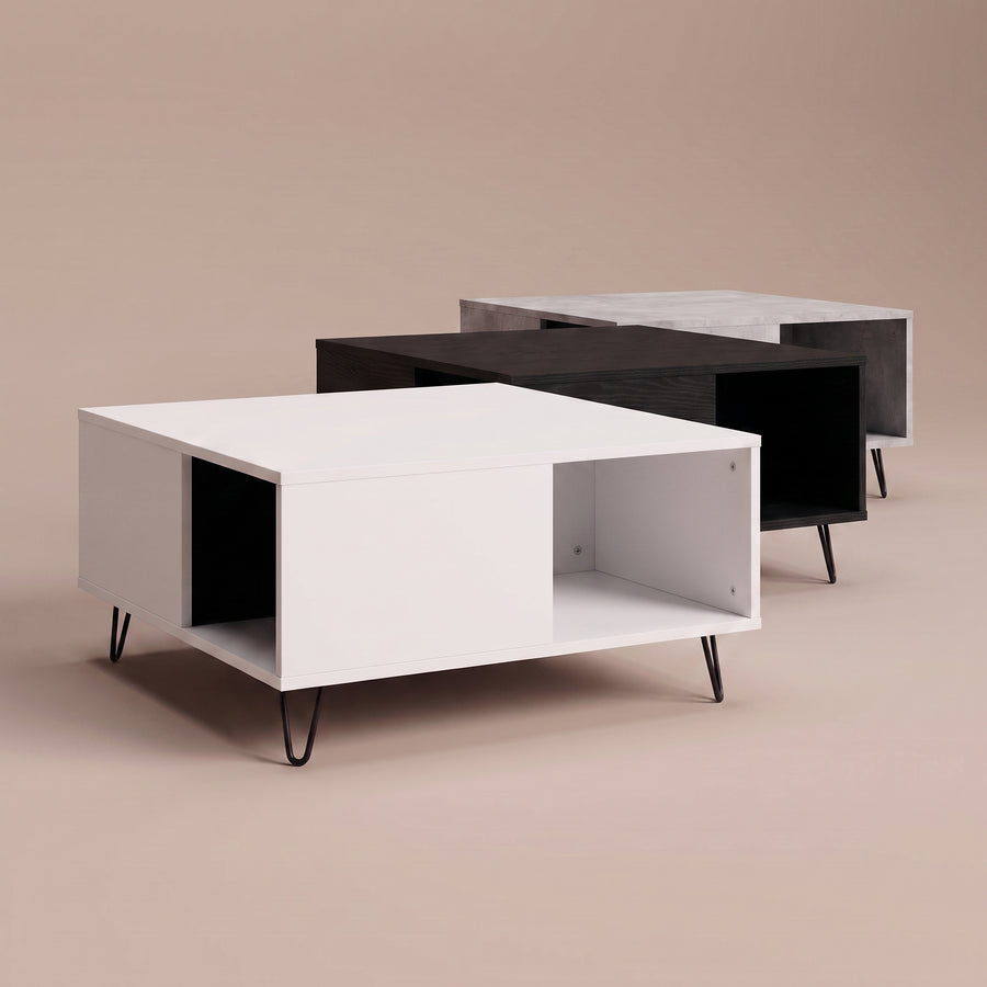 Quadra — trois finitions très typées : blanc, chêne noir, gris béton