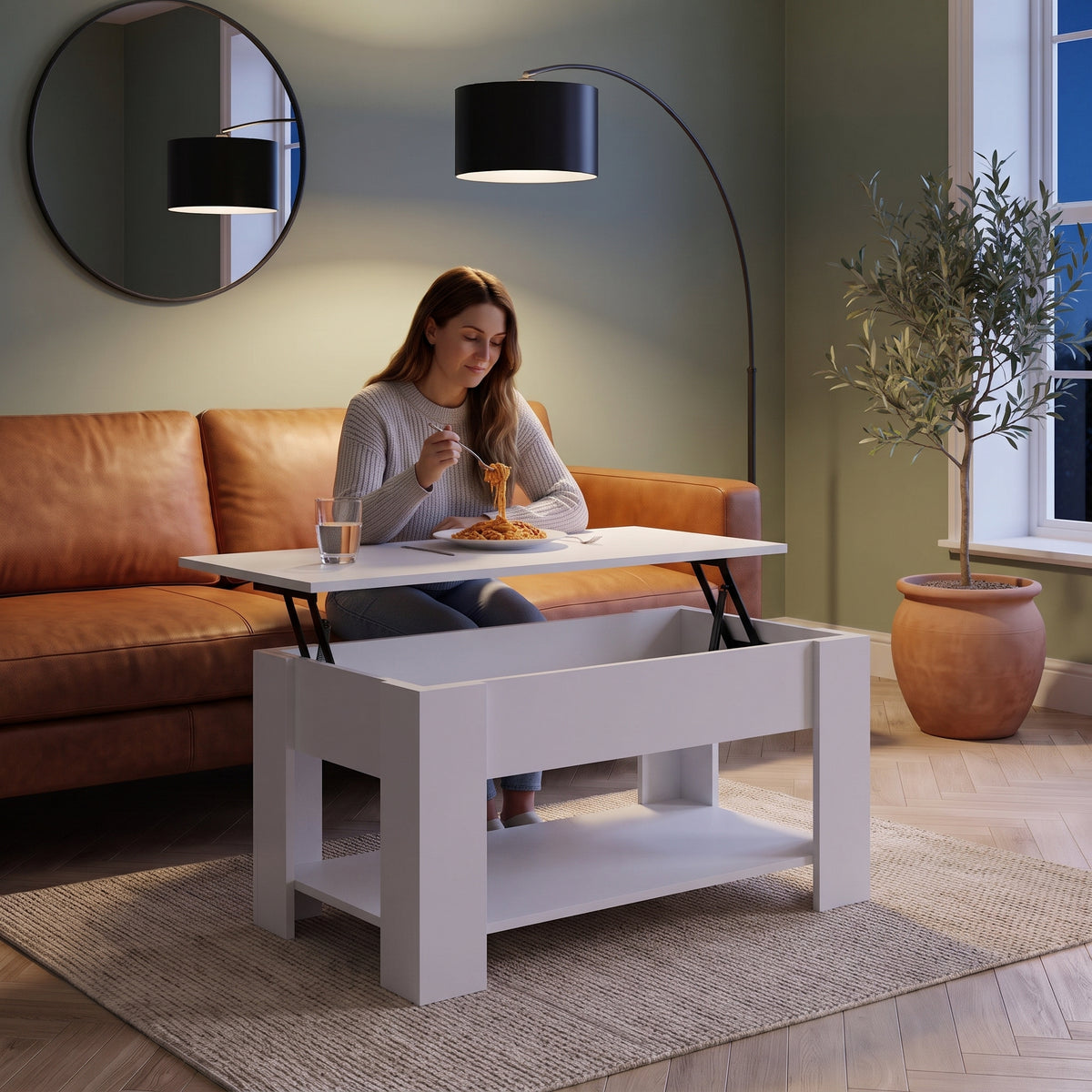 Table basse relevable avec rangement Onda blanc , 101 × 49 × 52 cm au quotidien : dîner devant un film sur le plateau relevé #Couleur_Blanc #Dimensions_101 × 49 × 52 cm