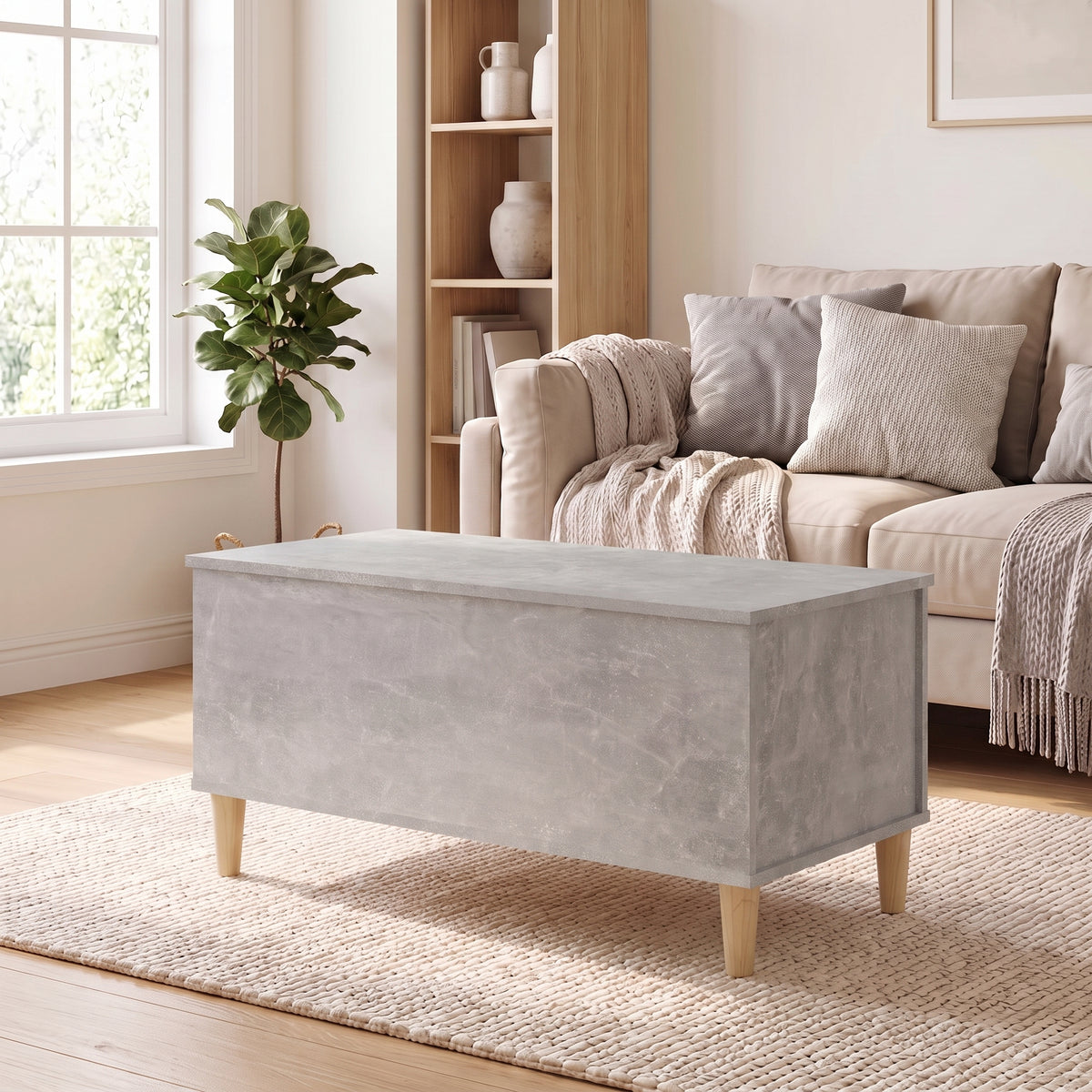 Table basse relevable Sylva gris béton dans un salon lumineux #Dimensions_90 × 44,5 × 45 cm #Couleur_Gris béton